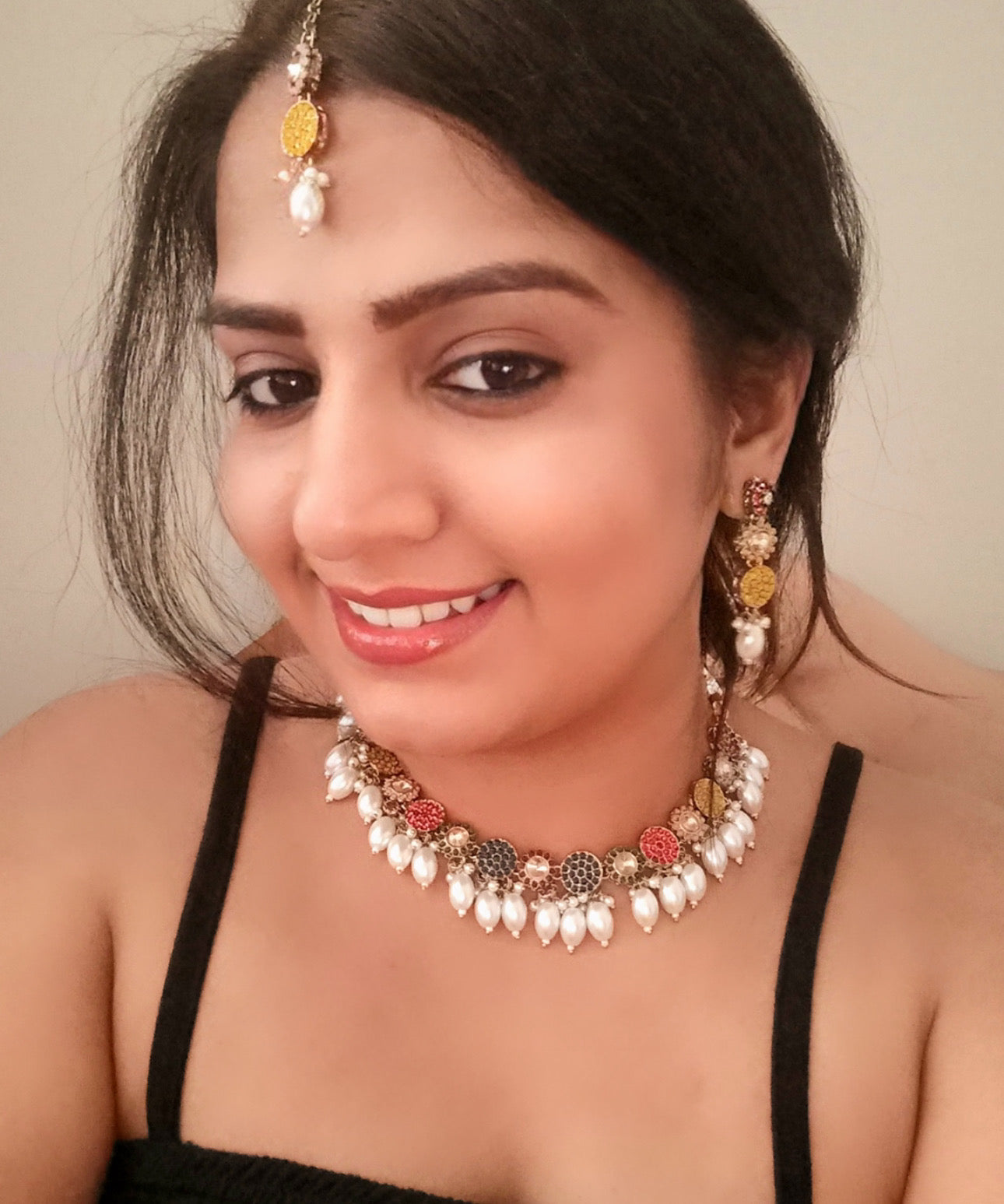 Model displaying A Pakistani Kundan Choker Necklace & Earrings With Tika for sale in London by bella n diva online.