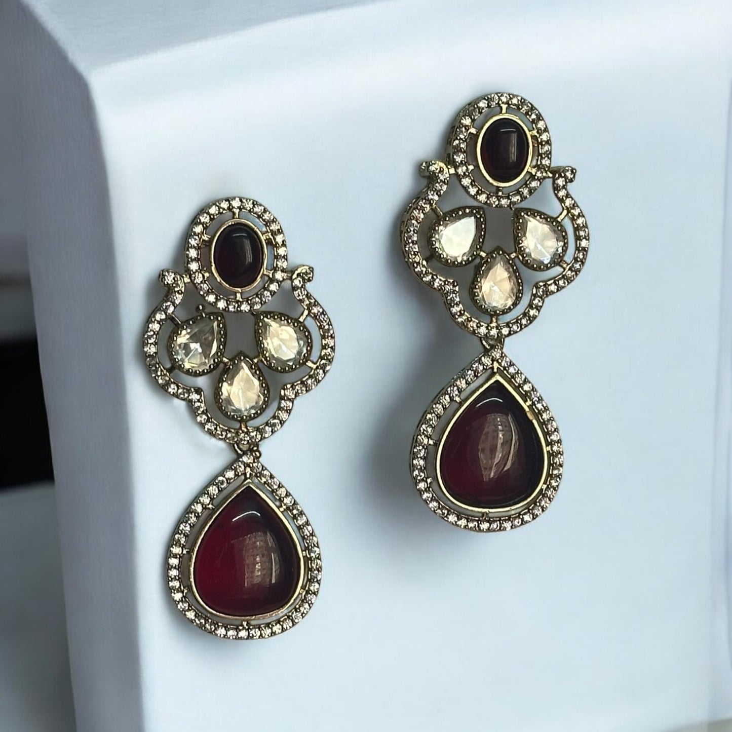 Premium Moissanite Red Kundan Earrings set featuring intricate detailing and rich red tones for a luxurious statement.