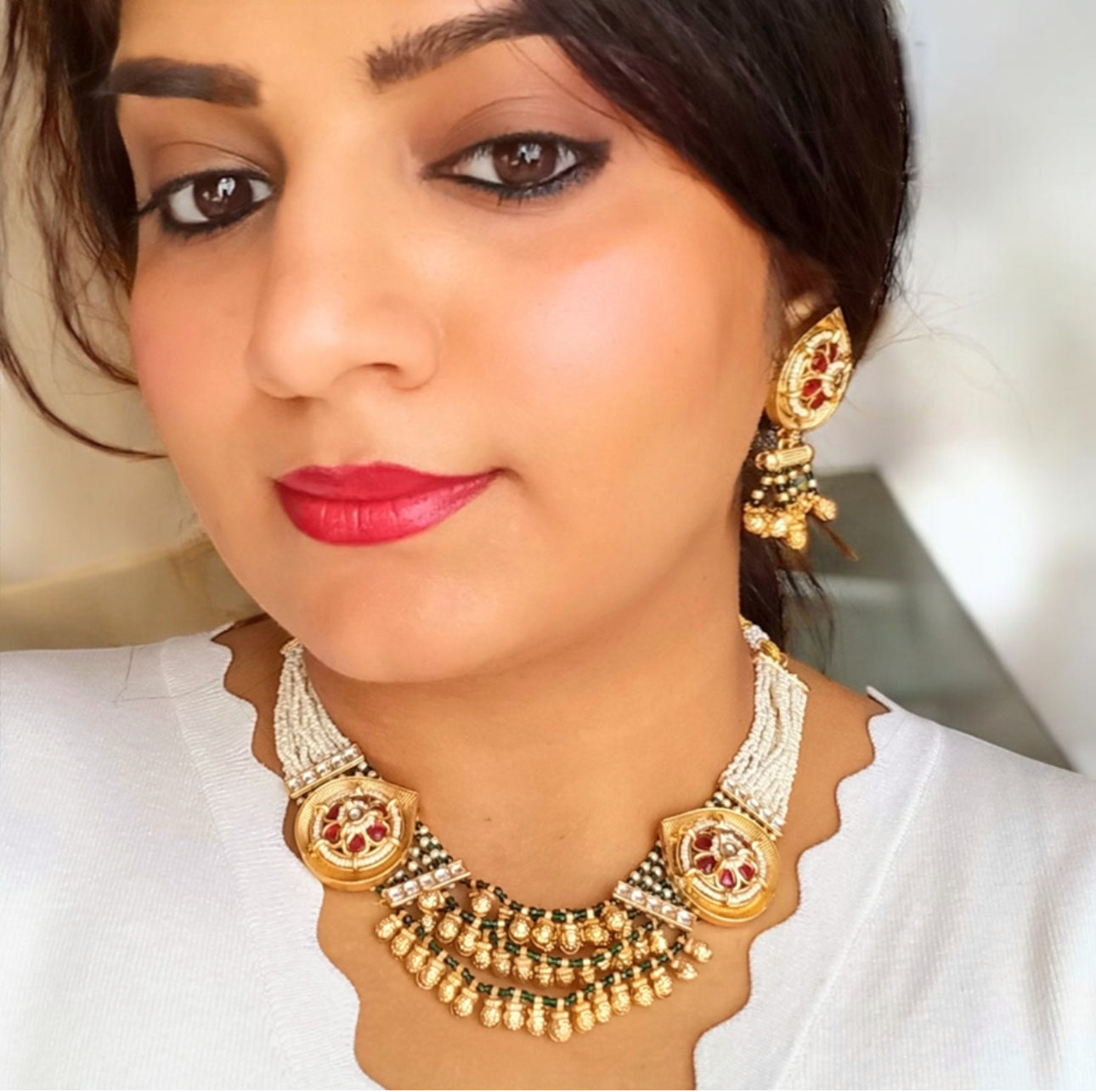 Close up of A model displaying Rajwadi Kundan Necklace And Earrings - Kundan Jewellery