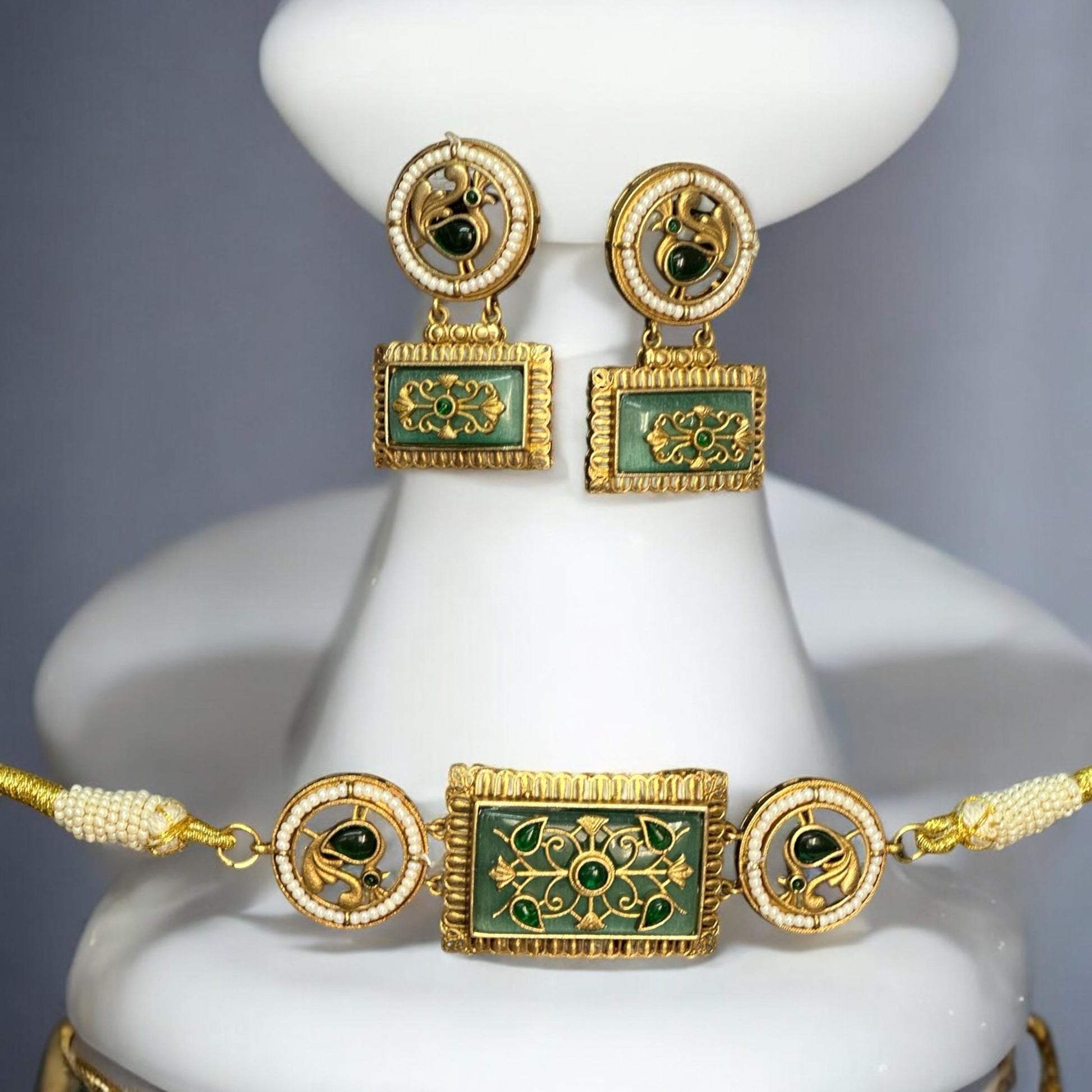 Amrapali Minimal Choker Set in Mint Green Monalisa Stone Work with matching earrings and gold-tone accents, displayed elegantly on a white stand.