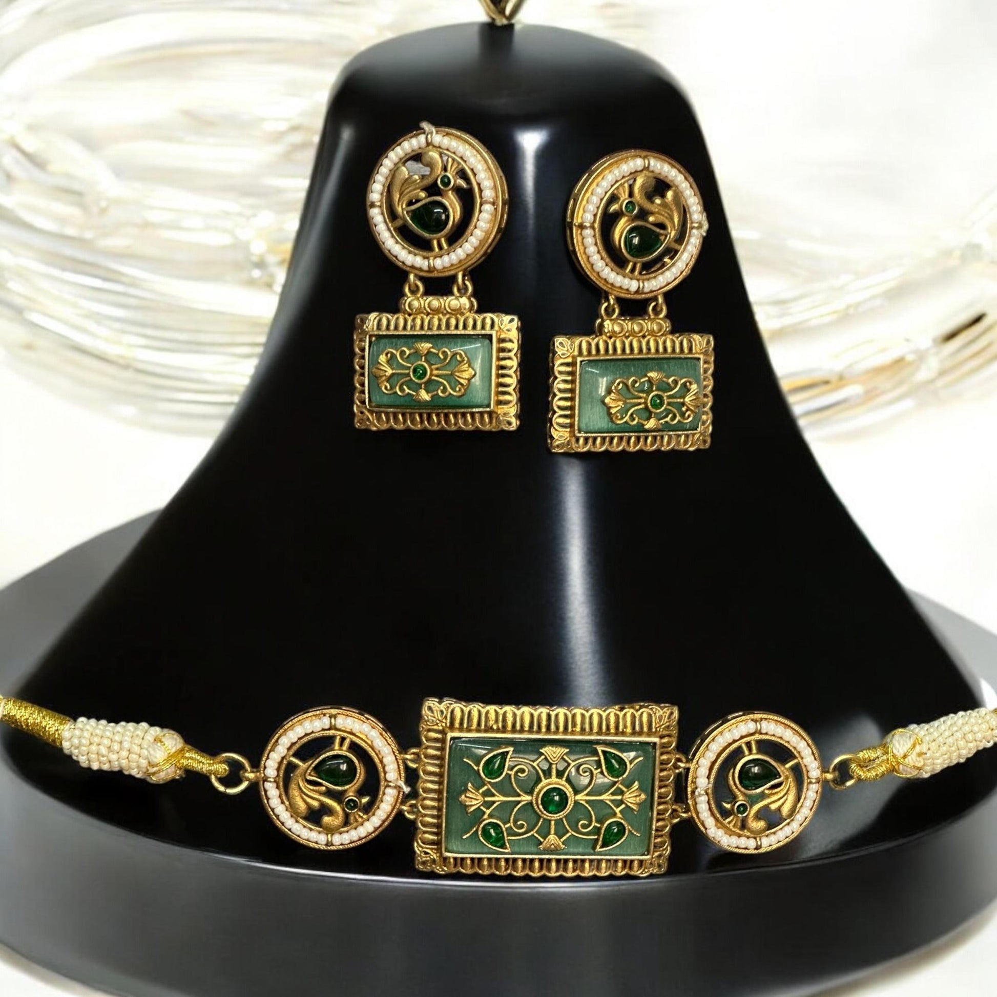 Amrapali Minimal Choker Set in Mint Green Monalisa Stone Work with matching earrings and gold-tone accents, displayed elegantly on a Black Jewellery display stand.