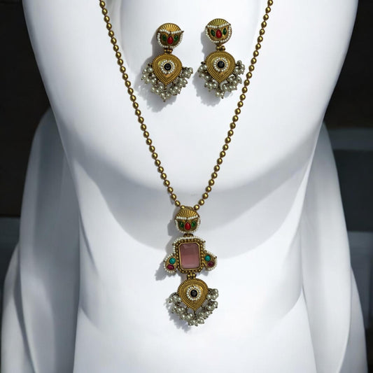 Amrapali Pachi Kundan Long Chain Pendant Set with Pink Monalisa Stone, featuring intricate detailing and matching earrings.