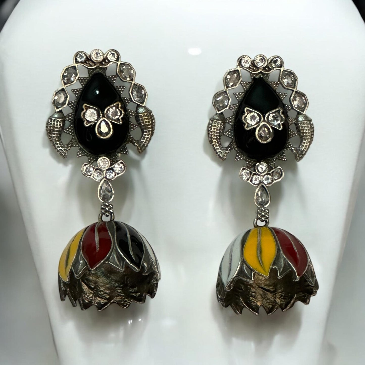 Multi-colour handprint silver replica jhumki earrings featuring black, red, yellow and white enamel – designer jewellery by Bella & Diva.