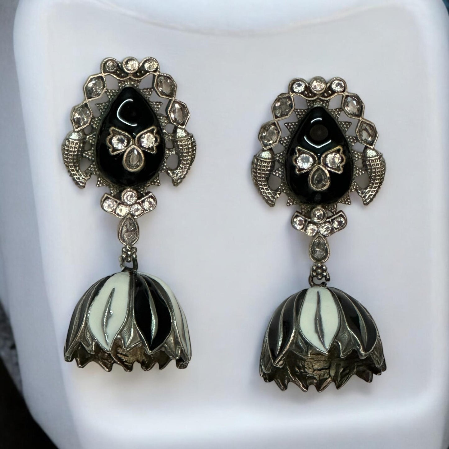 Silver replica jhumki earrings with black and white enamel dome and crystal detailing – Indian designer jewellery by Bella & Diva.