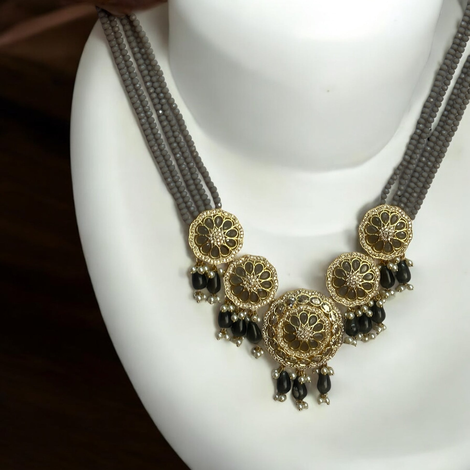Kundan Pearl Grey Necklace  – multi-layered grey beaded necklace featuring gold-toned kundan work, pearl accents. Perfect for festive and wedding occasions.