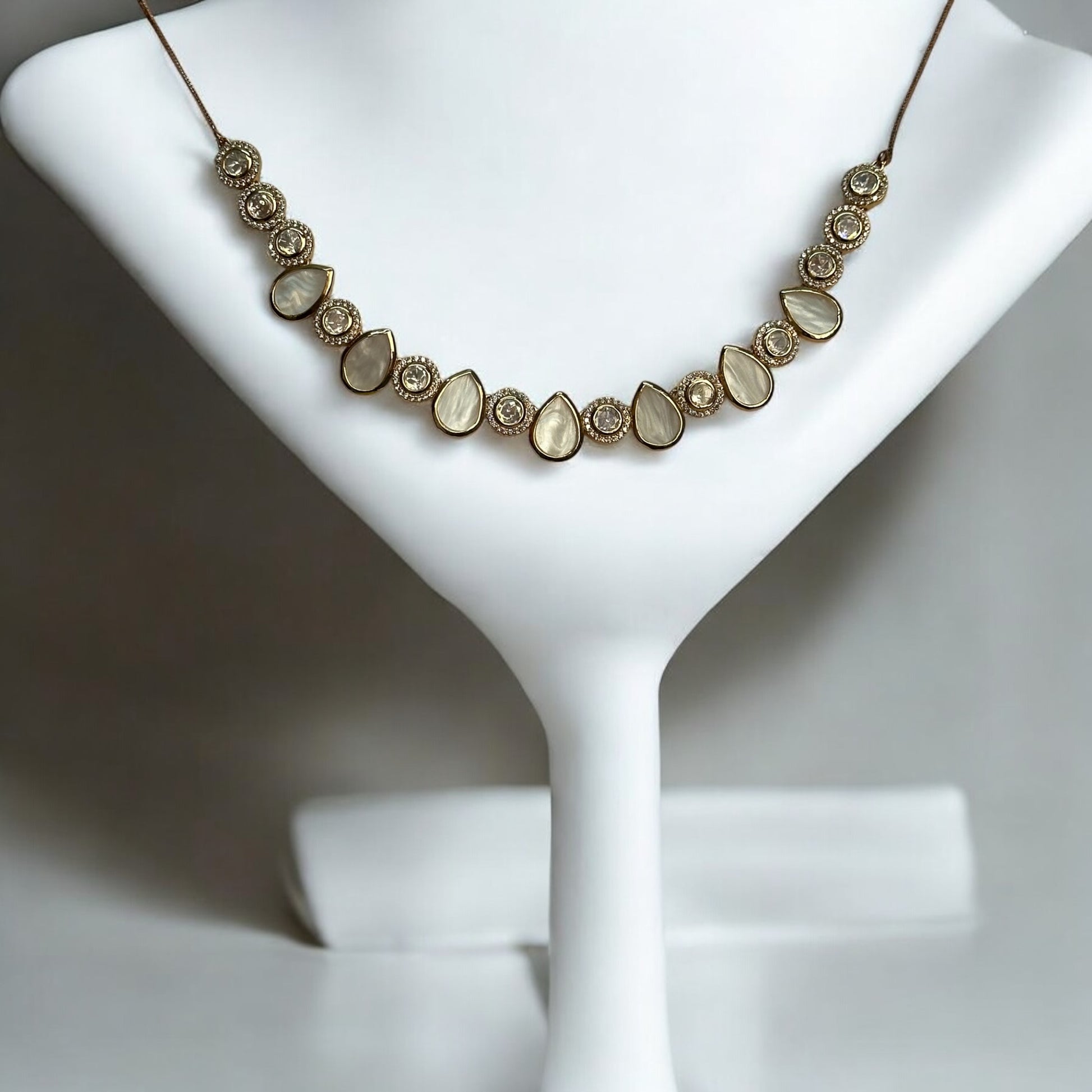Premium Real Mother of Pearl with Polki Kundan Necklace – elegant gold-tone necklace featuring real mother-of-pearl teardrop and polki kundan accents. Perfect for weddings and festive wear.