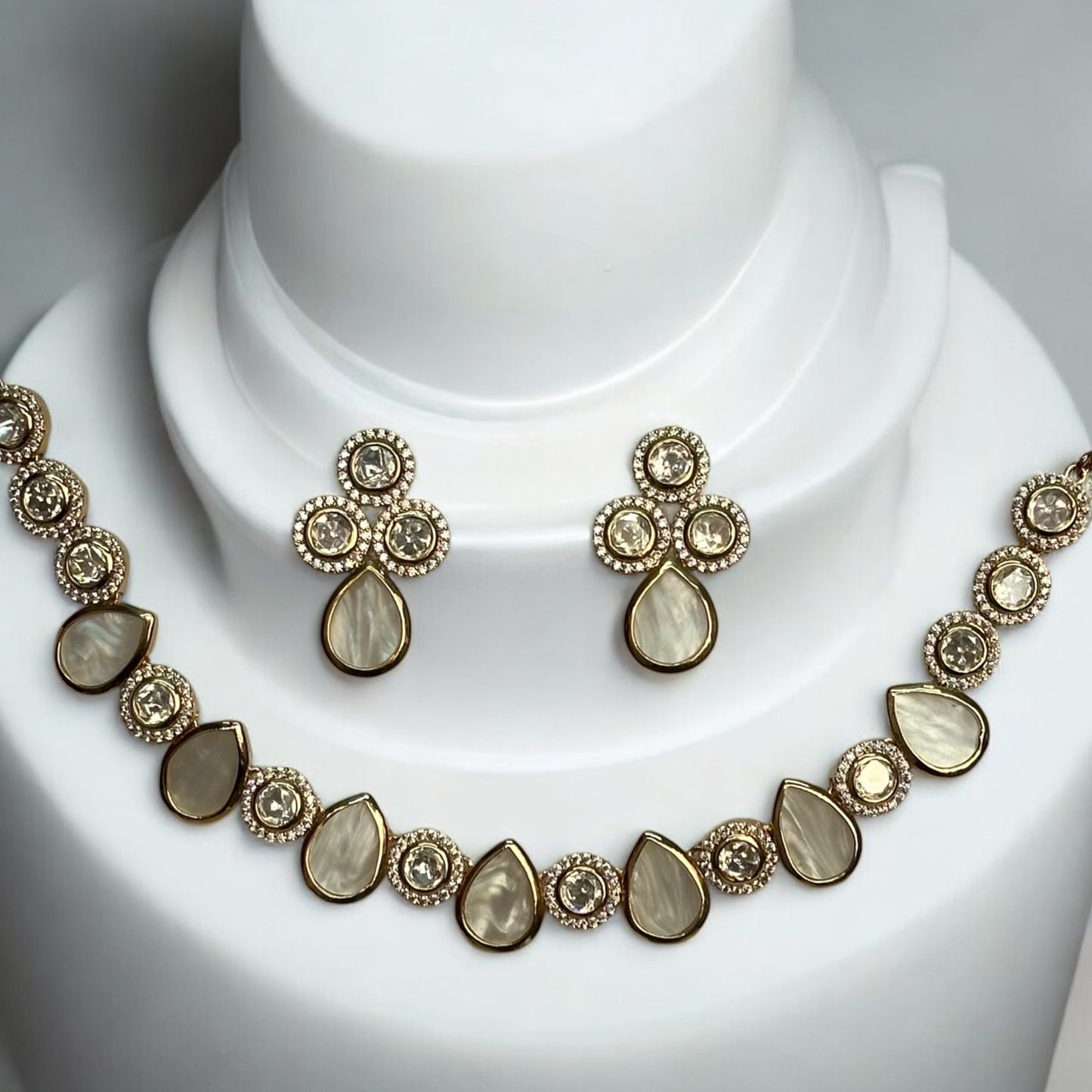 Premium Real Mother of Pearl with Polki Kundan Necklace and Earrings – elegant gold-tone necklace featuring real mother-of-pearl teardrop and polki kundan accents with matching earrings. Perfect for weddings and festive wear.