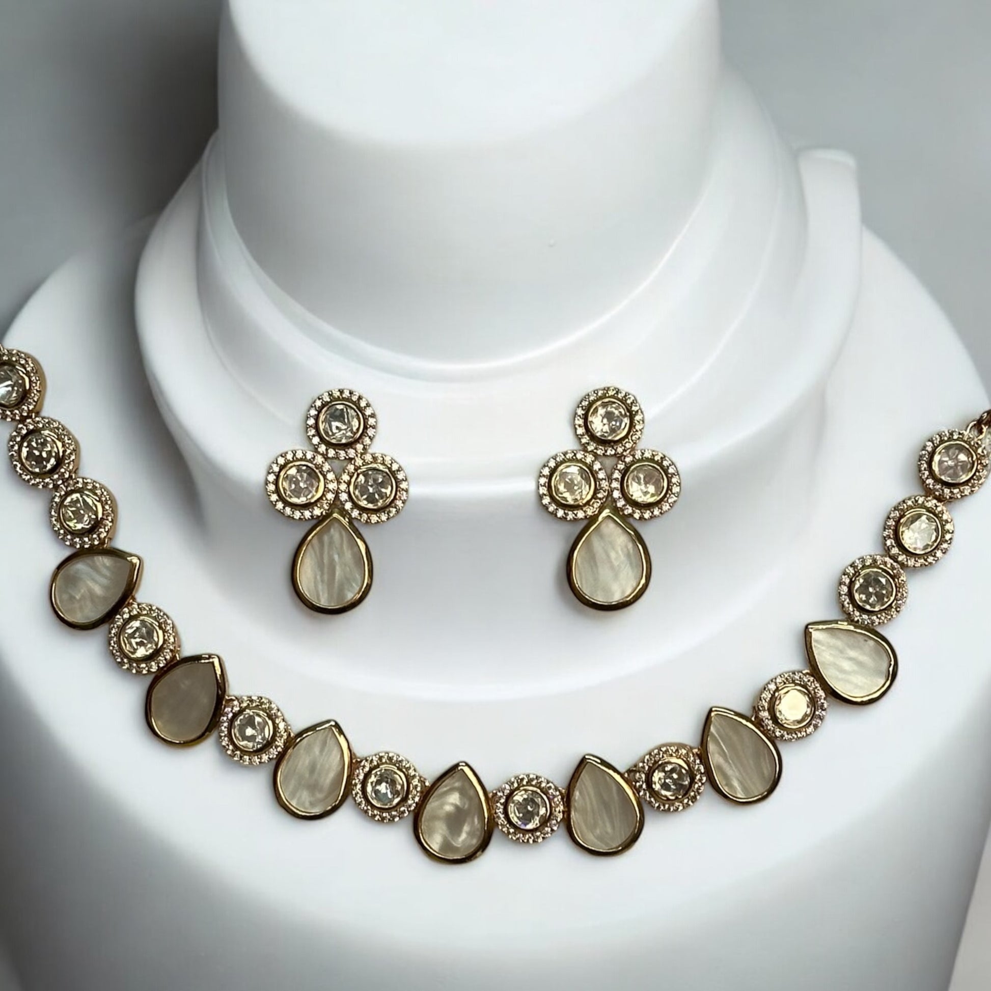 Premium Real Mother of Pearl with Polki Kundan Necklace and Earrings – elegant gold-tone necklace featuring real mother-of-pearl teardrop and polki kundan accents with matching earrings. Perfect for weddings and festive wear.