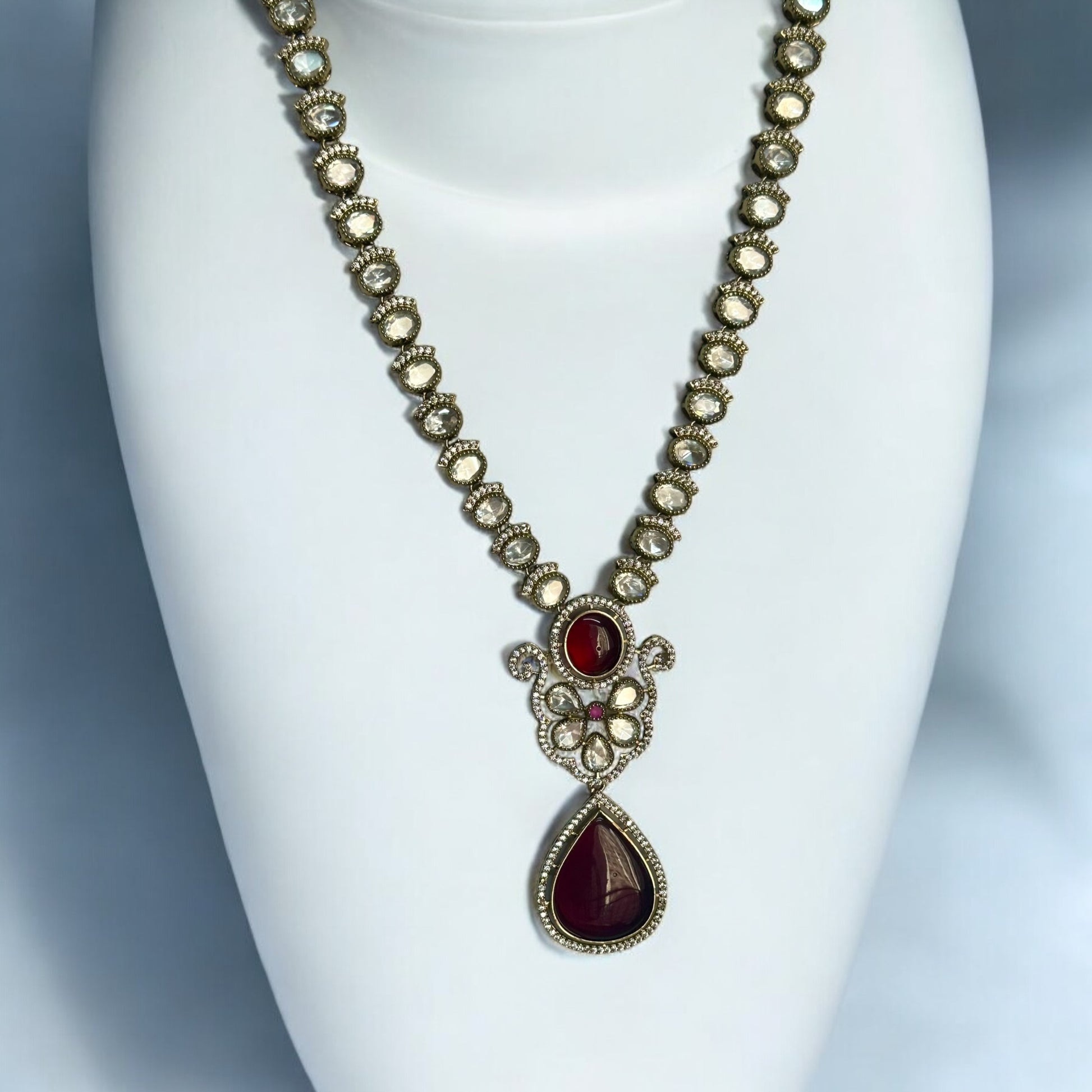 Premium Moissanite Red Kundan Necklace set featuring intricate detailing and rich red tones for a luxurious statement.