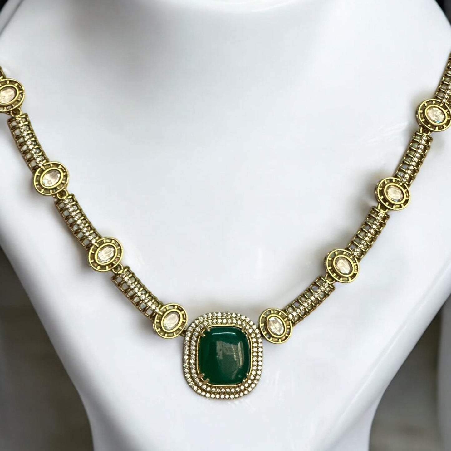 Premium Polki Kundan Necklace Set with Earrings in Green Color – elegant gold-tone necklace with vibrant green stones and polki kundan work. Perfect for weddings and festive occasions.