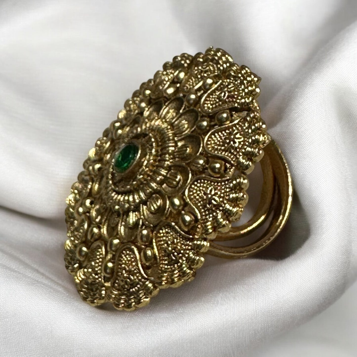 Rajwadi Adjustable Finger Ring side view kept on a white fabric