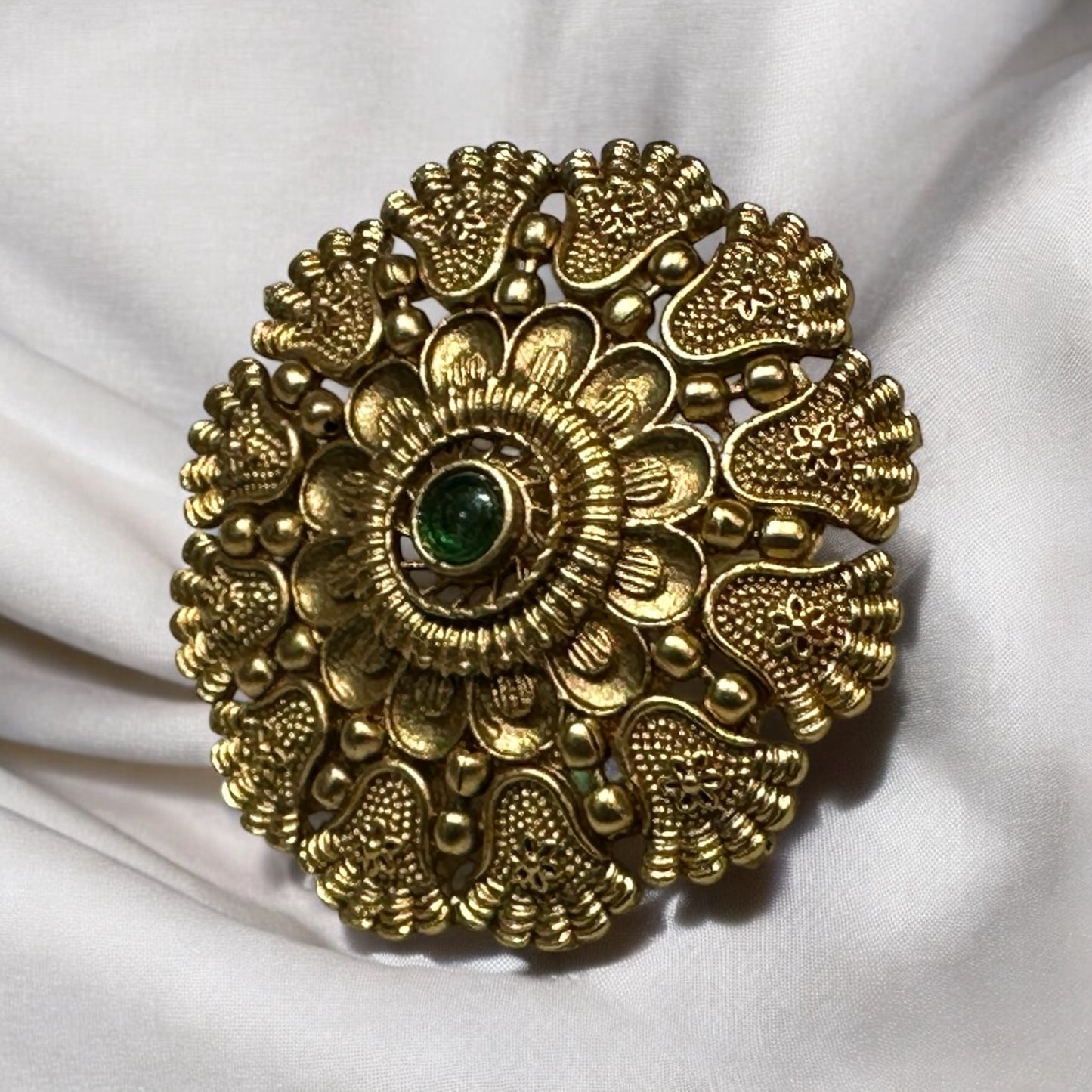 Rajwadi Adjustable Finger Ring front view kept on a white fabric