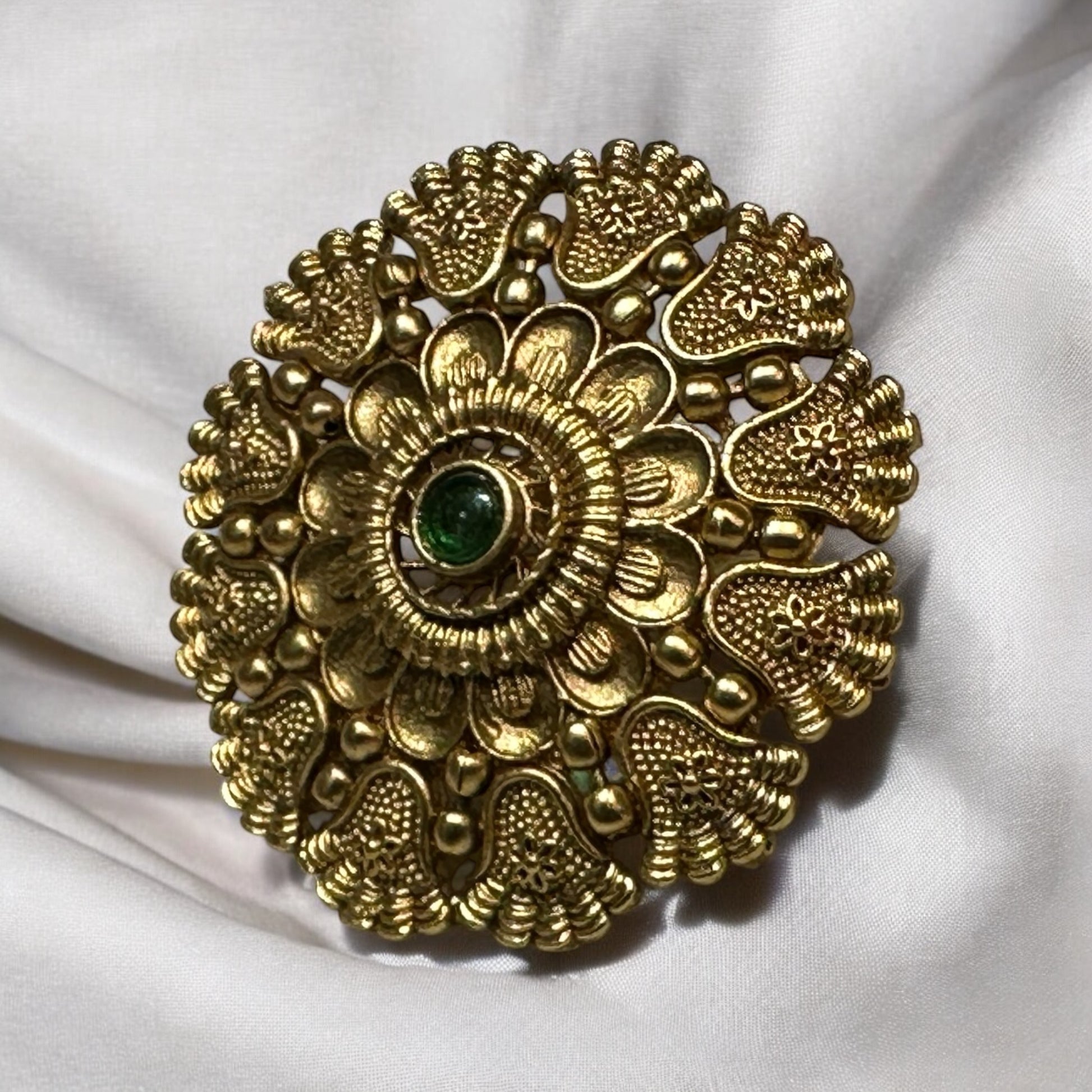 Rajwadi Adjustable Finger Ring front view kept on a white fabric
