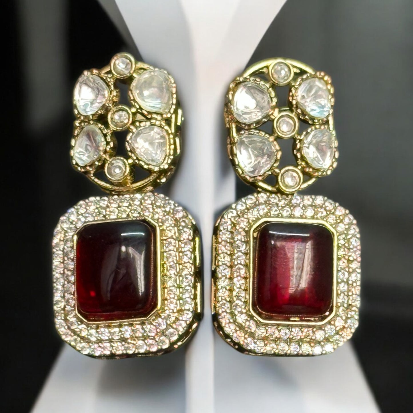 Real Moissanite Kundan Long Necklace sets' Earrings with red gemstones with intricate detailing.