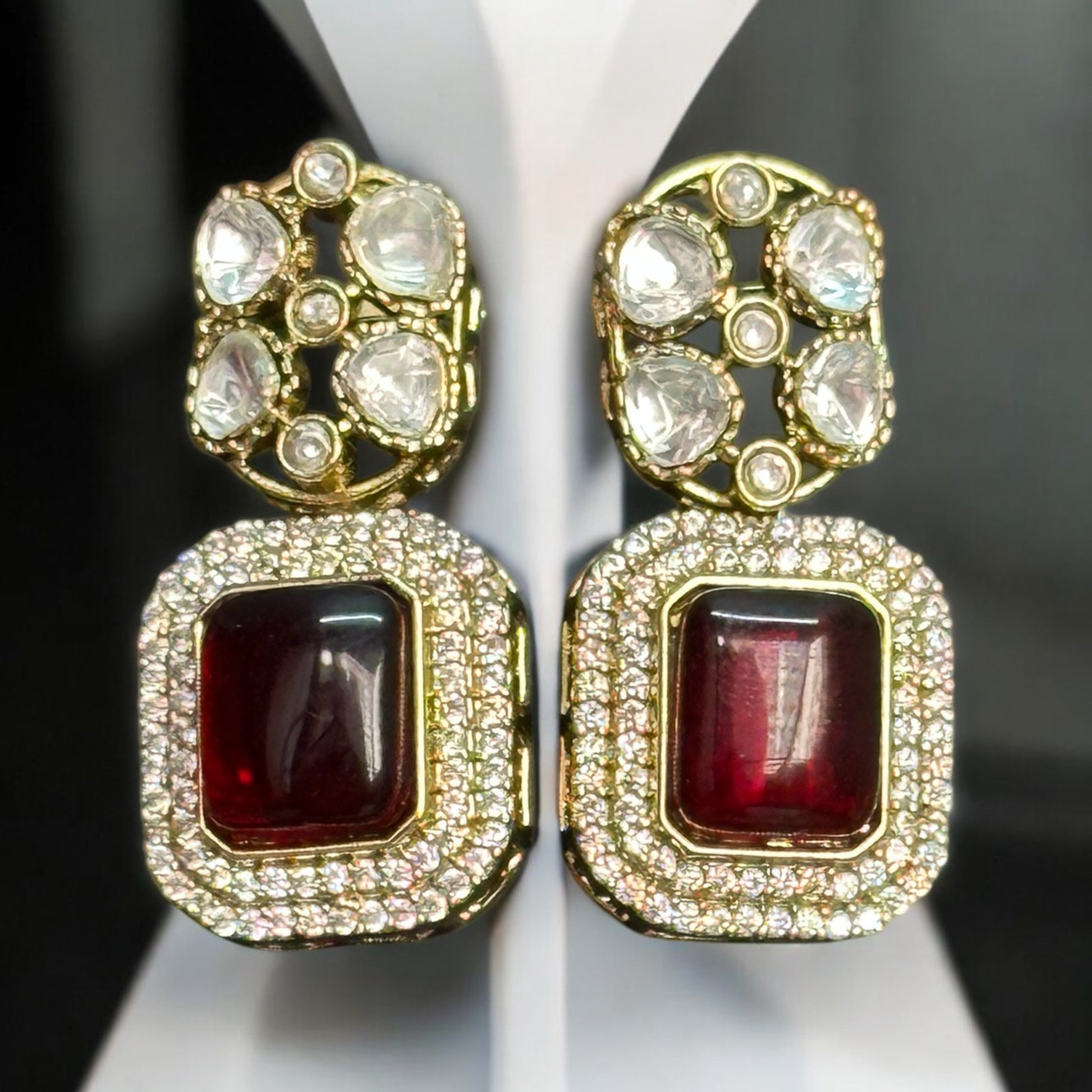 Real Moissanite Kundan Long Necklace sets' Earrings with red gemstones with intricate detailing.