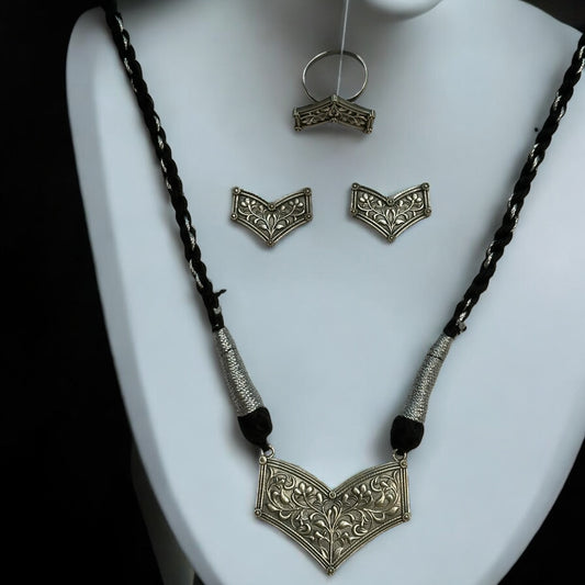Silver Look-Alike Handmade Combo Set with Earrings and Ring – intricately designed silver-tone necklace with matching earrings and adjustable ring. Perfect for ethnic and boho outfits.