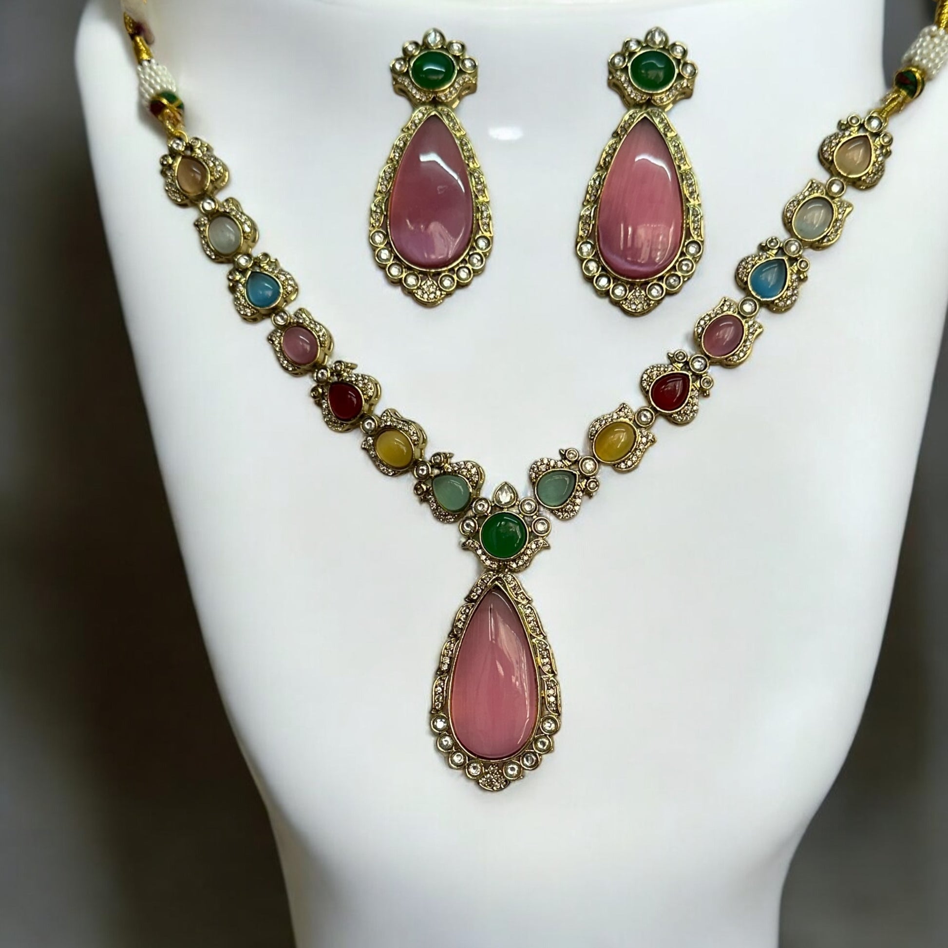 Statement Multicolor Polki Kundan Necklace with Pink Earrings – featuring a colorful design with intricate Kundan work and bold pink accents.